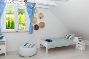 Postel nebo postele na pokoji v ubytování Lakeside Home