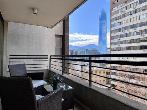 Apartamentos City Centro Los Leones tesisinde bir balkon veya teras
