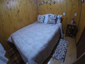 Tempat tidur dalam kamar di Casa Cochilo do Vô Tadeu