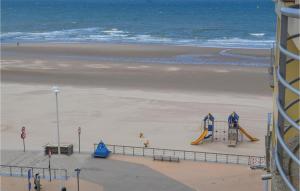 an aerial view of a beach with a playground at Residentie Zon & Zee Ref 20 in Ostend