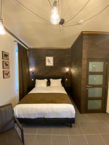 מיטה או מיטות בחדר ב-J and R Brussels City Apartment