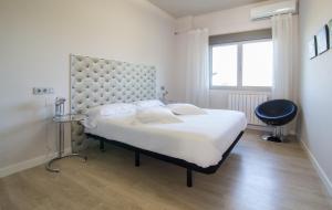 Postel nebo postele na pokoji v ubytování RuralSuite Hotel Apartamentos