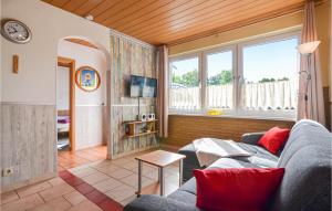 Μια τηλεόραση ή/και κέντρο ψυχαγωγίας στο Holiday Home Lindenberg R
