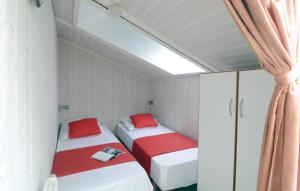 Postel nebo postele na pokoji v ubytování Strandpark 3