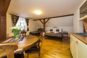 Posteľ alebo postele v izbe v ubytovaní Vila Krumlov
