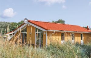 a house with an orange roof at Schatzkiste 7 - Dorf 4 in Travemünde