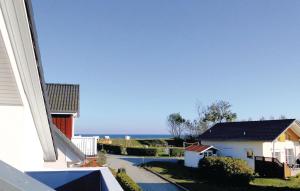 SüssauにあるHaus Seeadler 5の家のバルコニーから海の景色を望めます。