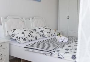 Posteľ alebo postele v izbe v ubytovaní Apartment Diocletian