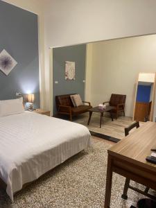Katil atau katil-katil dalam bilik di Freedom B&B