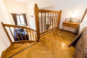 Posteľ alebo postele v izbe v ubytovaní Vila Krumlov