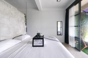 Postel nebo postele na pokoji v ubytování OCEANNA - Uluwatu, Bali