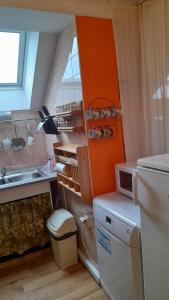 Kuchyň nebo kuchyňský kout v ubytování Apartmány Prima