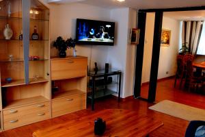 TV a/nebo společenská místnost v ubytování Haus Veni