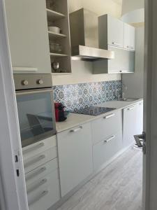 Kuchyňa alebo kuchynka v ubytovaní Address Home I Colori Del Mare