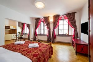 Posteľ alebo postele v izbe v ubytovaní Vila Krumlov