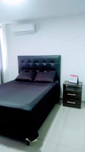 Ένα ή περισσότερα κρεβάτια σε δωμάτιο στο EQUIPETROL Apartamento Entero BARUC DOS # 27