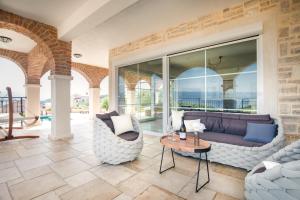 Ein Sitzbereich in der Unterkunft Villa Santa Maria