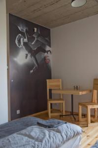 Posteľ alebo postele v izbe v ubytovaní Trafo Base Camp