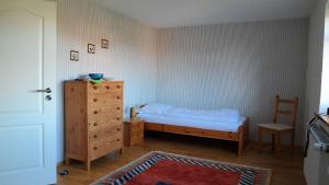 Tempat tidur dalam kamar di Nordsee-1