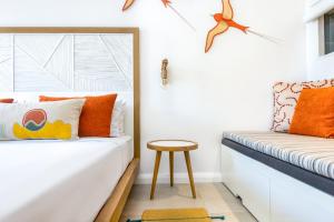 Кровать или кровати в номере Sunrise Attitude (Adults Only)