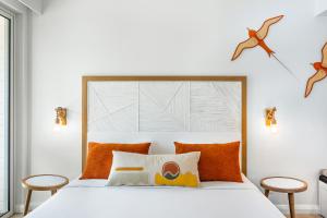 Кровать или кровати в номере Sunrise Attitude (Adults Only)