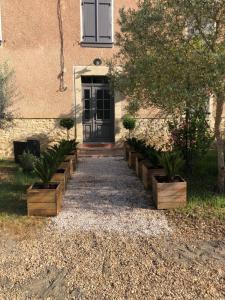 Vonkajšia záhrada v ubytovaní La Bastide 1767 Villa de charme avec piscine 15x5, climatisation, 4 chambres, cuisine extérieur