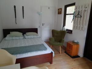Giường trong phòng chung tại Siedlisko Owink