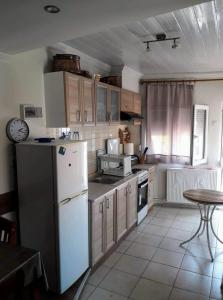 Kuchyň nebo kuchyňský kout v ubytování Vasilis traditional House