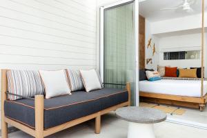 Кровать или кровати в номере Sunrise Attitude (Adults Only)