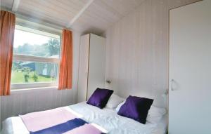 Postel nebo postele na pokoji v ubytování Strandblick 15