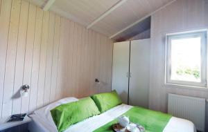 Postel nebo postele na pokoji v ubytování Strandblick 15
