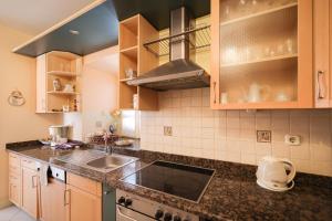 a kitchen with a sink and a counter top at Two bedroom apartment in city center Igor in Zadar