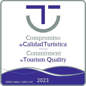 a logo for the committee called cubed tucson committee commitment to tourism quality at Beni Qásim 1915 in Benicàssim