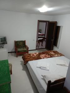 A bed or beds in a room at Casa Bekirebeki