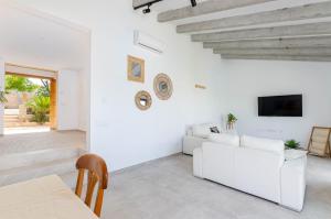 Seating area sa YourHouse Can Covetes, villa with private pool and garden, perfect for families