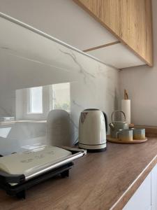 Fotografie z fotogalerie ubytování Boutique Athensairport Apartments v destinaci Markopoulon