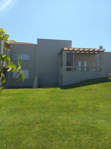 A garden outside Grand Afroditi LUX