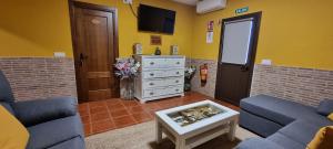 TV a/nebo společenská místnost v ubytování Apartamento Turistico "El Rincón de la Pernila"