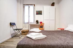 Posteľ alebo postele v izbe v ubytovaní Bologna City Center Apartment by Wonderful Italy
