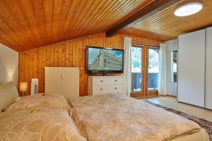 Postel nebo postele na pokoji v ubytování Chiemgautraum