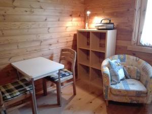 Posezení v ubytování Hof Kranichweide, Holzblockhaus