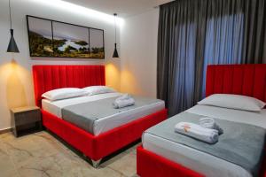 Postel nebo postele na pokoji v ubytování Hotel Eagle