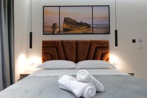 Postel nebo postele na pokoji v ubytování Hotel Eagle