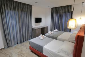 Postel nebo postele na pokoji v ubytování Hotel Eagle