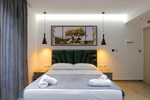 Postel nebo postele na pokoji v ubytování Hotel Eagle + 37 fotografií