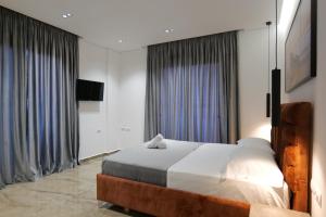 Postel nebo postele na pokoji v ubytování Hotel Eagle