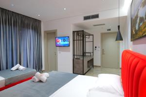 Postel nebo postele na pokoji v ubytování Hotel Eagle