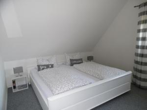 Postel nebo postele na pokoji v ubytování Landhaus Martina