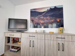 TV a/nebo společenská místnost v ubytování Apartamentos El Pozo