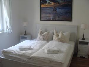 Ein Bett oder Betten in einem Zimmer der Unterkunft Goetheresidenz Bad Saarow